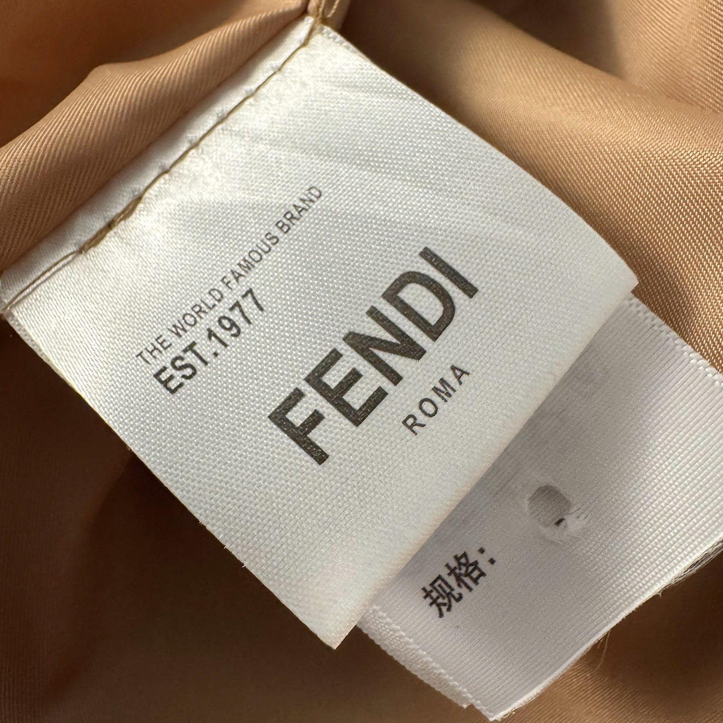 Fendi down jacket with knit sleeves