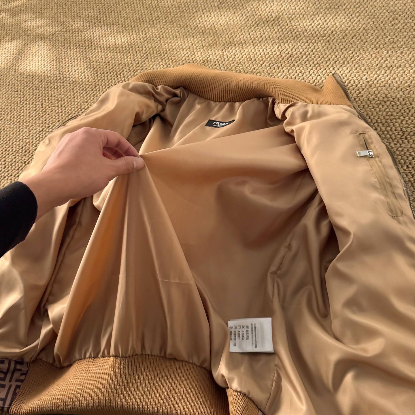 Fendi down jacket with knit sleeves