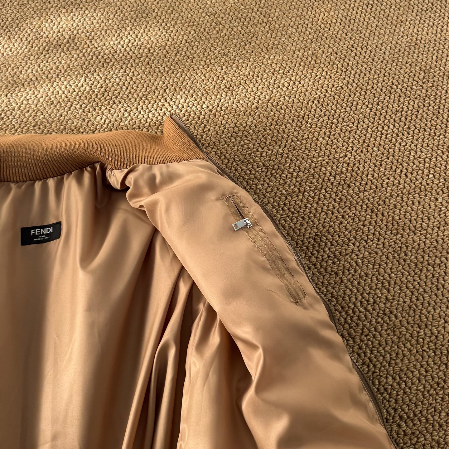 Fendi down jacket with knit sleeves