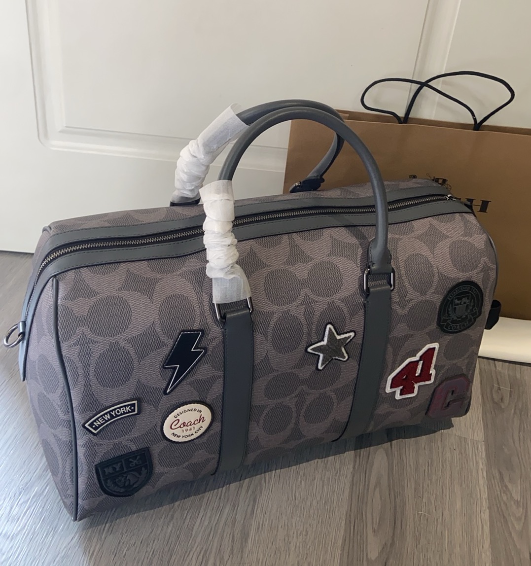 Men Handbag CCG42 Venturer Travel Bag In Maxi Signature Canvas With Patches